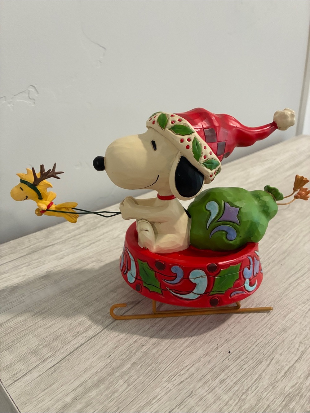 Jim Shore Snoopy Sleigh Figurine - Red, Green & Cream